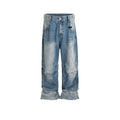 Men's light blue baggy jeans with front pleats and a straight-leg fit on a plain background.