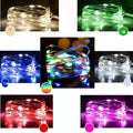 12-metre long copper wire LED string lights with 120 bulbs and a USB plug, displayed with a light post.
