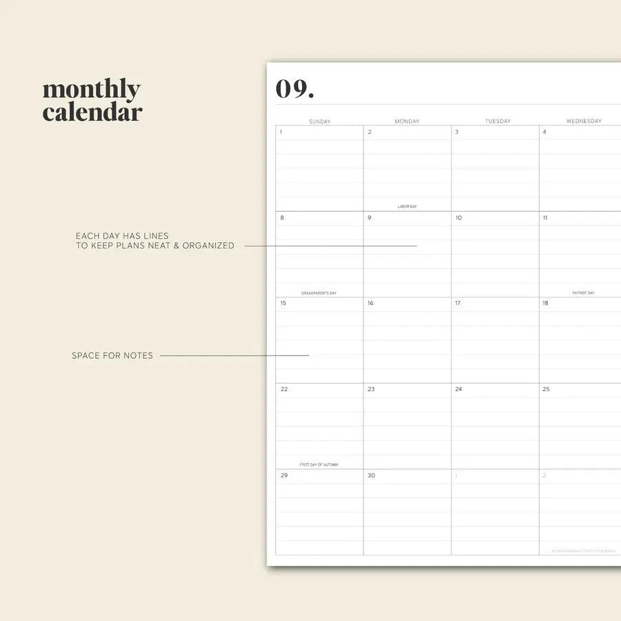Cherry red daily schedule coil notebook open showing wire binding and printed schedule pages