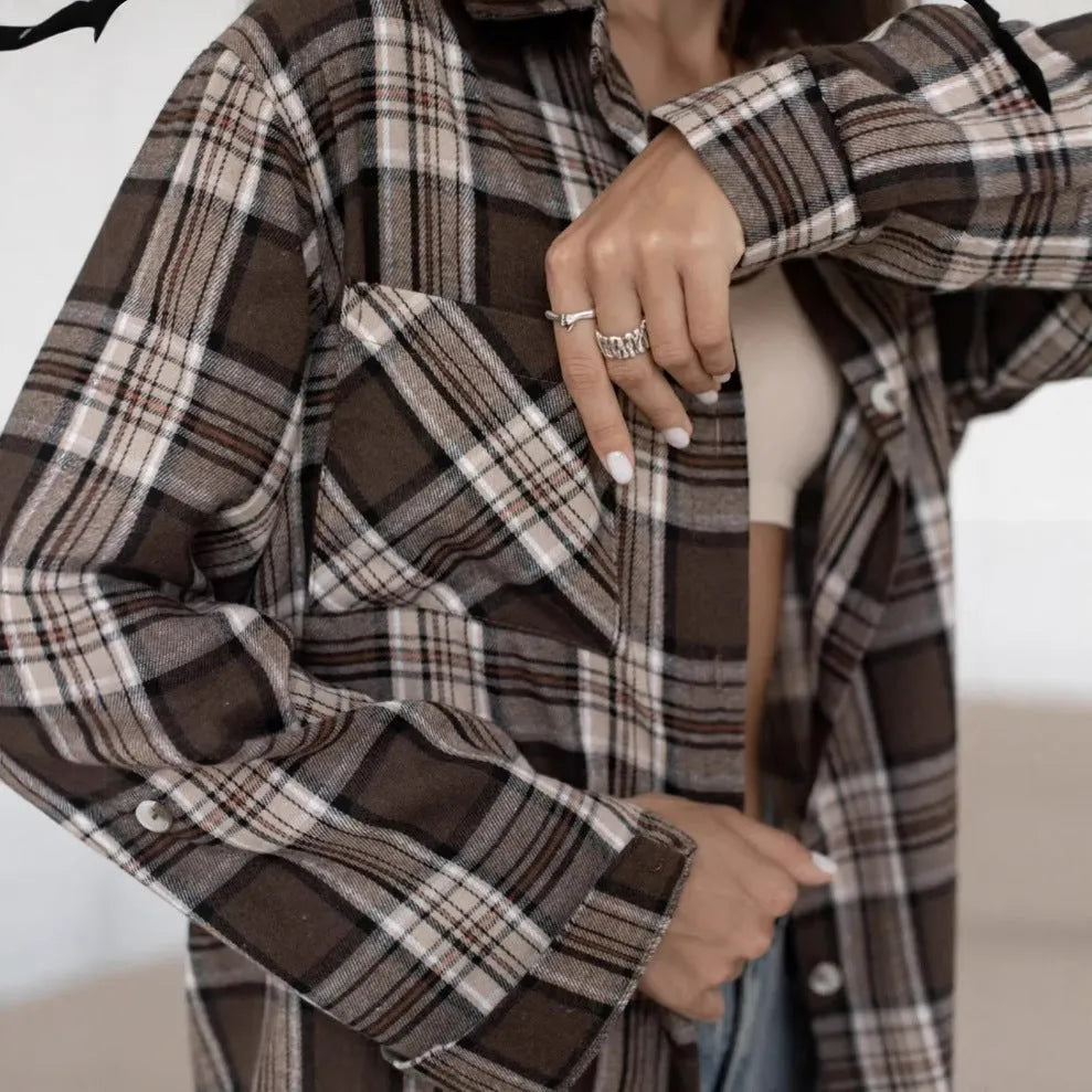 Dark brown striped women's shirt with long sleeves and retro collage stitching detail.