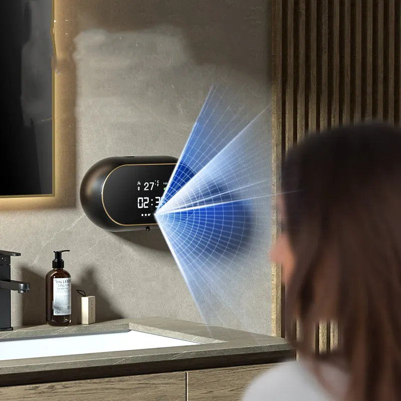 White automatic hand sanitizer foam dispenser mounted on wall with infrared sensor
