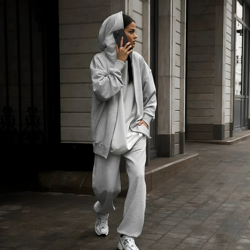 Street style loose fit two-piece set with long-sleeved coat and matching trousers in solid colour
