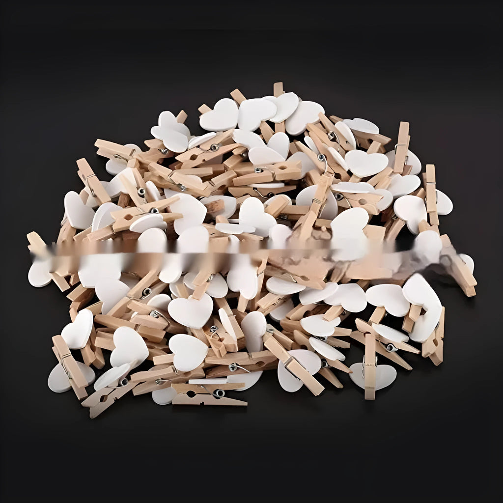 Set of five handmade solid wood heart-shaped clips in red, white, yellow, pink, and rose red.