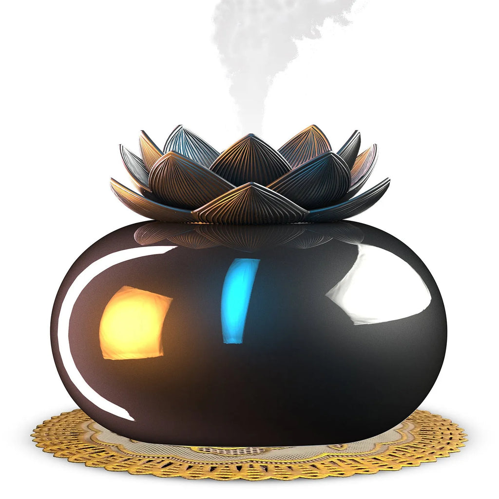 Pure black lotus-shaped USB aromatherapy humidifier on a desk.