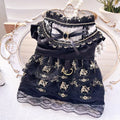 Golden Gothic princess-style skirt pet clothing for a small dog or cat on a mannequin.