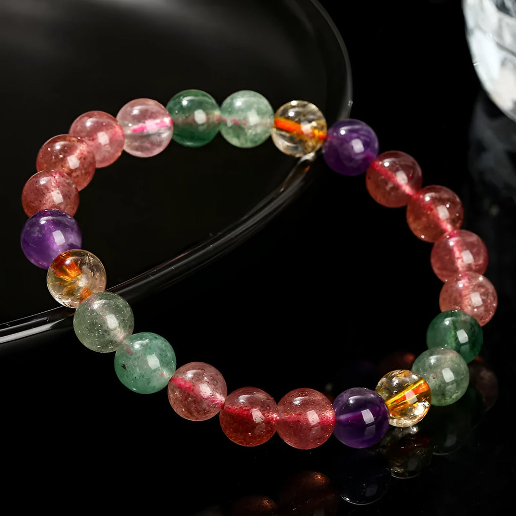 Strawberry quartz and tourmaline gemstone bracelet with round beads in geometry design