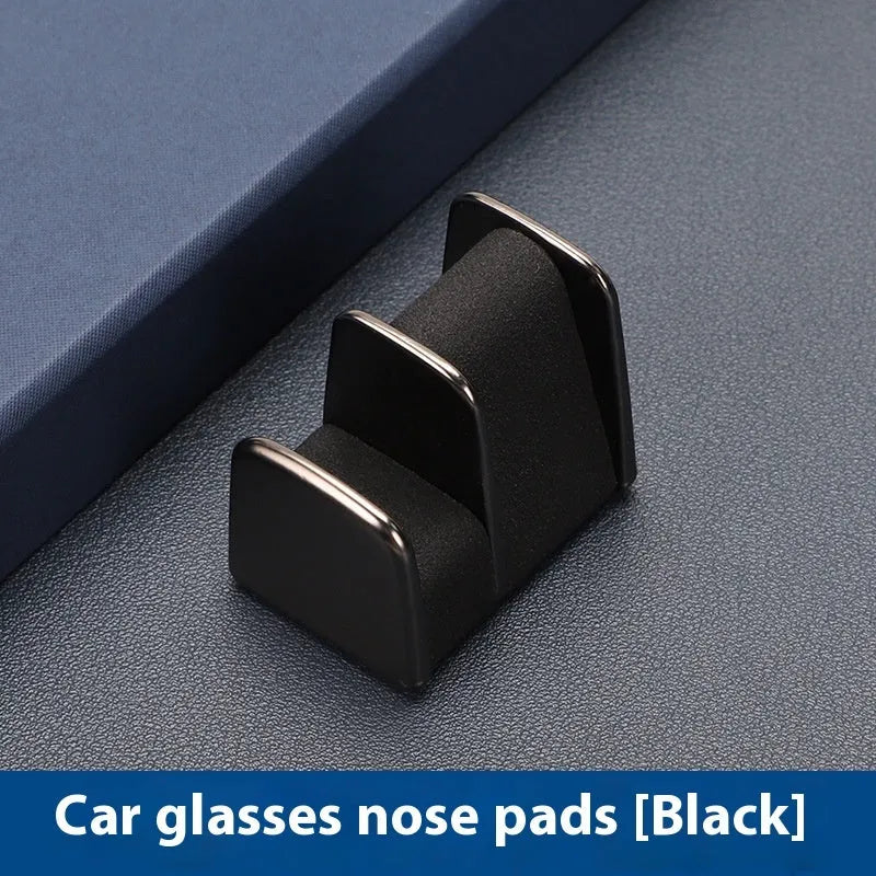 Zinc alloy and leather car dashboard glasses clip holder in green colour.