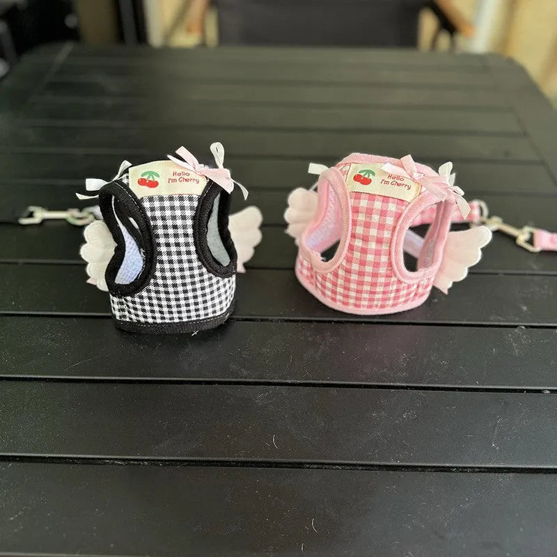 Pink and black cotton hands-free dog harness lead for small dogs showing chest and back straps.