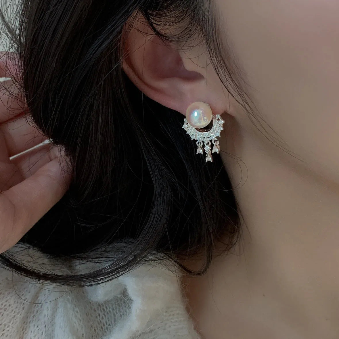 Artificial crystal water drop tassel earrings with round geometric shape and mosquito coil ear clip
