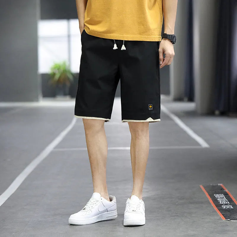 Korean style men's casual beach shorts in loose straight fit with elastic waistband