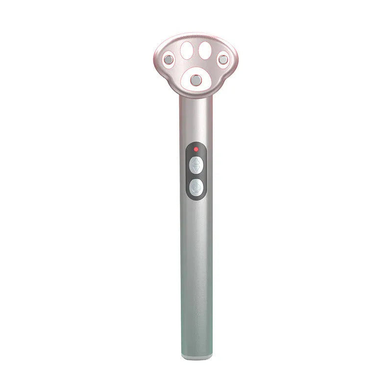 Cat's Paw design micro-current eye massager in gradient pink with LED light display.