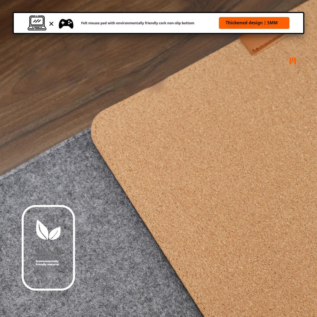 Winter warm felt cork office mouse mat with non-slip base in black and grey pattern on a desk.