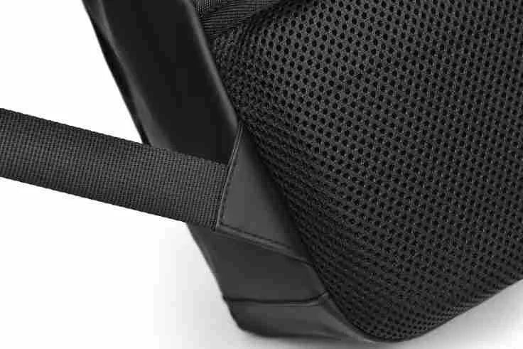 Large black waterproof PU leather computer backpack with simple design and sewing thread detailing