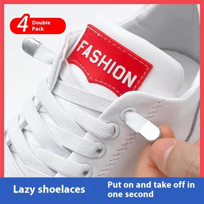 Elastic lace-free white shoelaces with flat buckle on a trainer, showing easy tie-free fastening