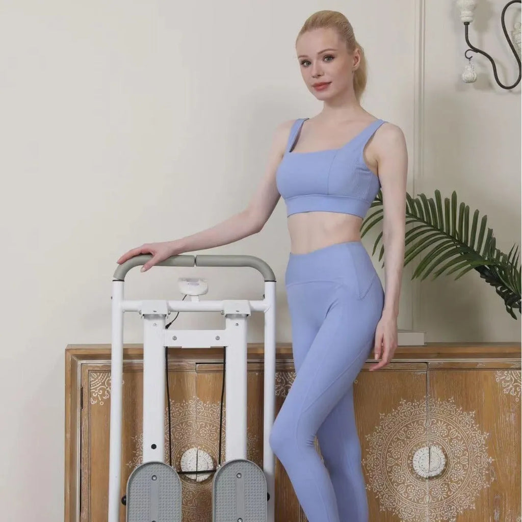Starlight White foldable treadmill and climbing frame combination home fitness machine.