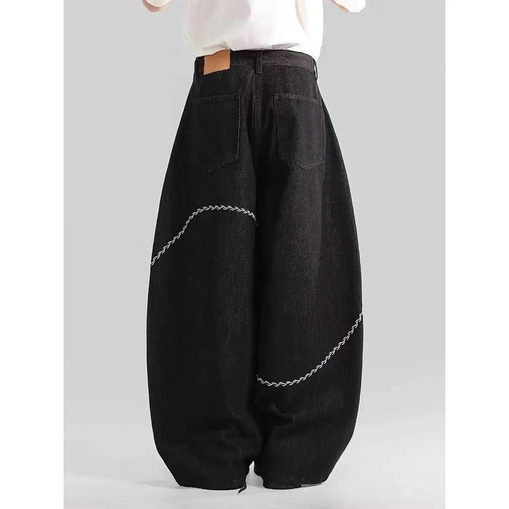 Black straight-leg trousers with zip fly placket and mid-waist design