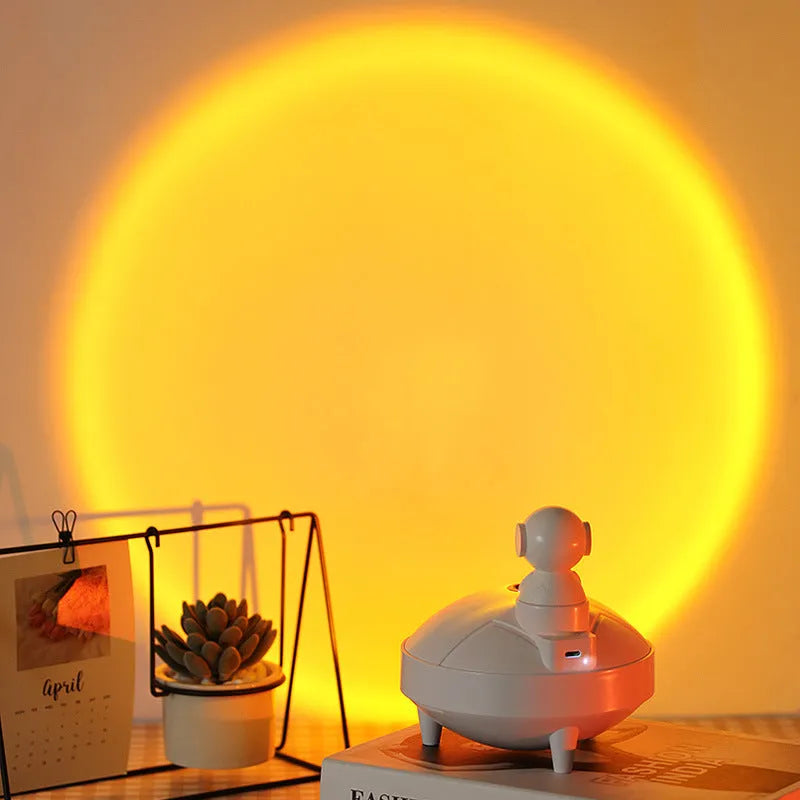 Astronaut sunset lamp humidifier in white with 360-degree rotating head and mist from single fog outlet