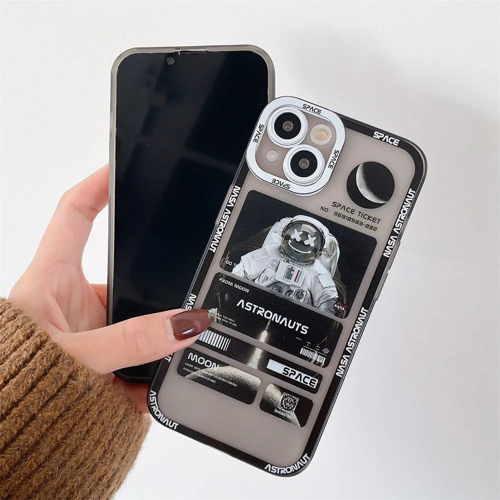 Blue-black silicone iPhone case with a graffiti-style space astronaut print, shown on an iPhone.