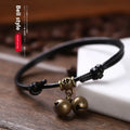 Nylon rope dog collar with brass bell, shown in black, red, and coffee colour options.