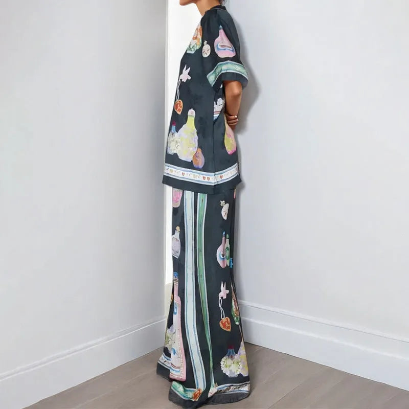 Black women's casual set with cartoon pattern featuring cardigan top and trousers