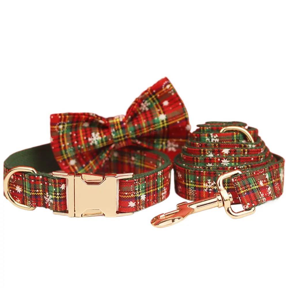 Green snowflake pattern Christmas pet collar, leash, bow, and vest four-piece set in cloth material