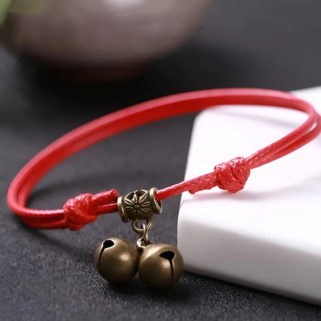 Nylon rope dog collar with brass bell, shown in black, red, and coffee colour options.