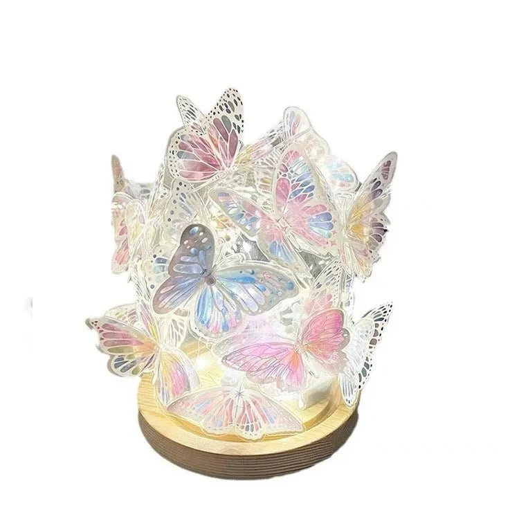 Handmade butterfly night lamp with glass shade and raw wood base measuring 12x15cm