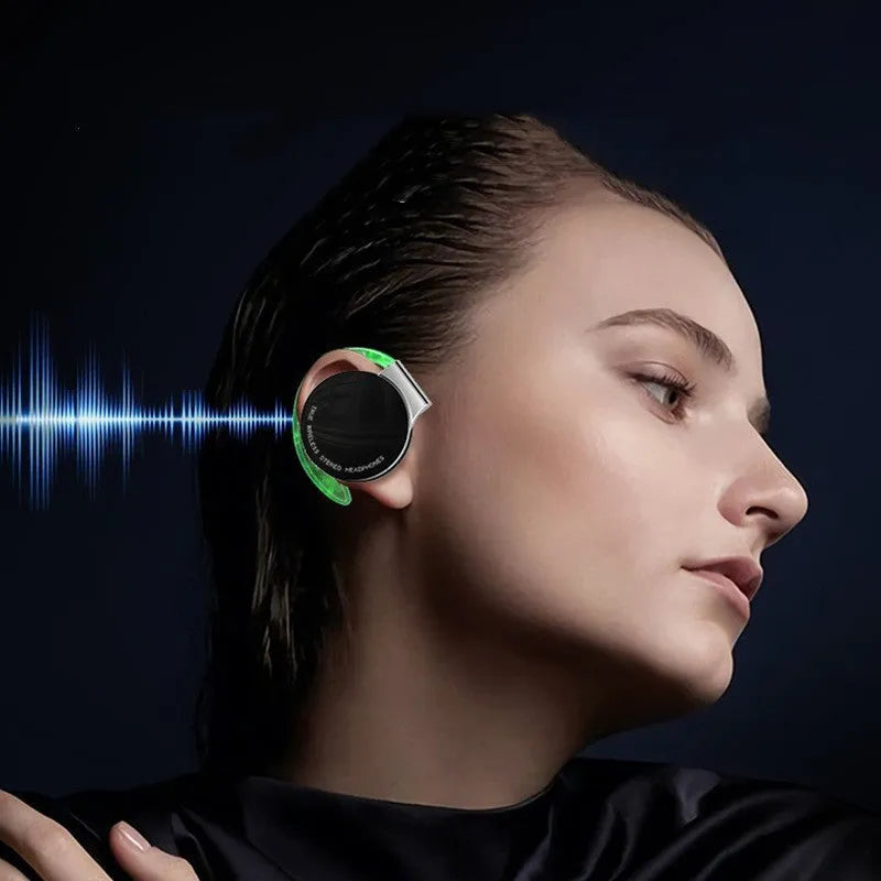 Black and white wireless sports Bluetooth earphones with ear plugs, shown with NFC and Bluetooth symbols.