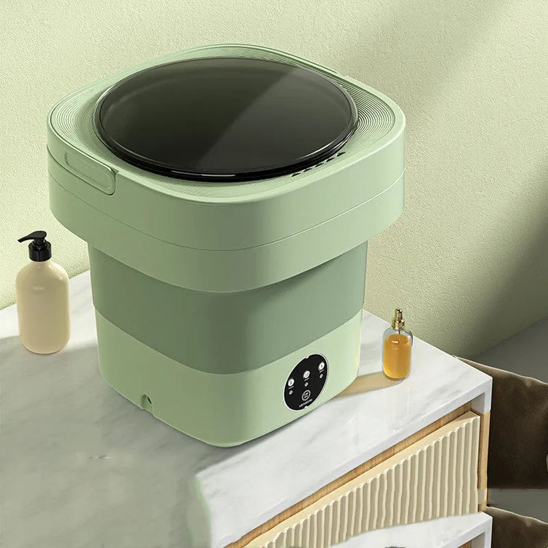 Portable folding washing machine in pine green colour with drain hose and basket