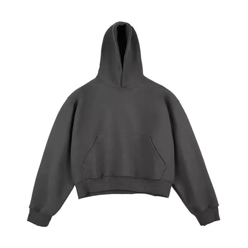 Man wearing a dark grey Chinese cotton composite hooded sweater with a removable hood and long sleeves.