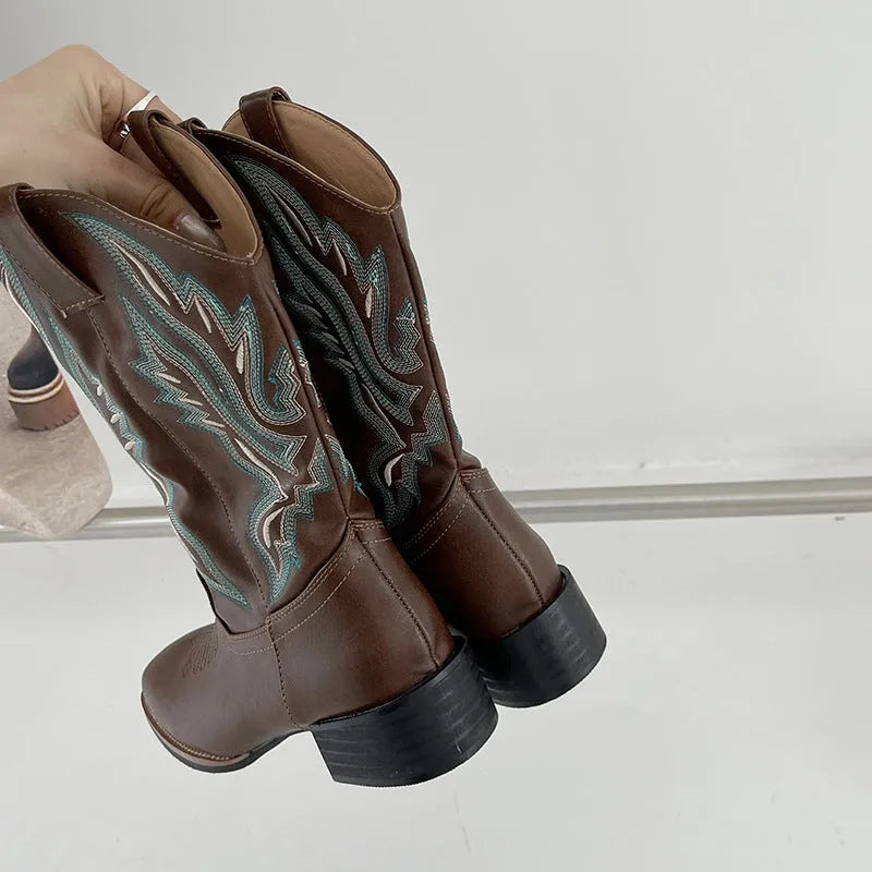 Brown women's mid-calf Martin boots with embroidery and a square low heel.
