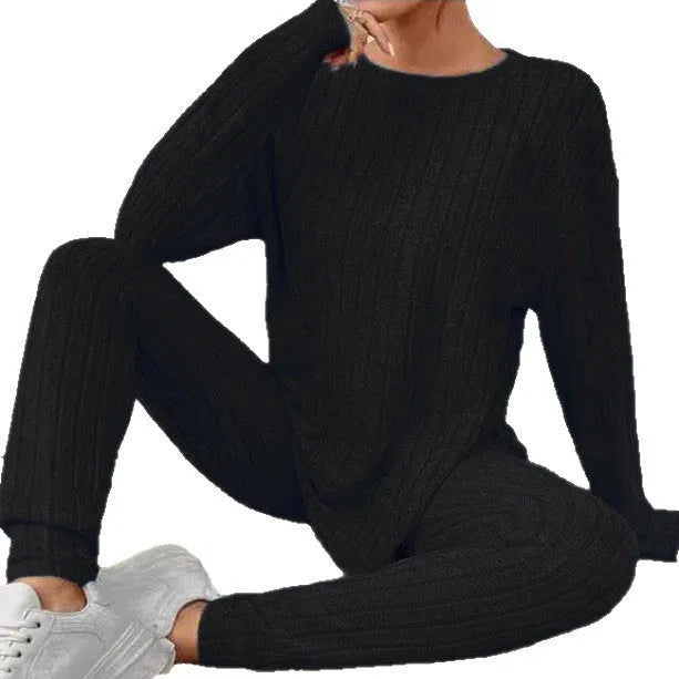 Women's sunken stripe pattern two-piece sportswear set with regular sleeve top and matching trousers