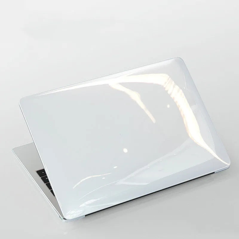 Transparent and black PC hard protective cases for 14-inch and 16-inch Apple MacBook Pro laptops.