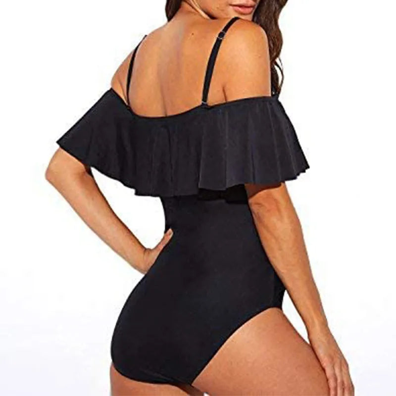 Black one-piece swimsuit with tube top, cut-out design and ruffled straps for swimming sports