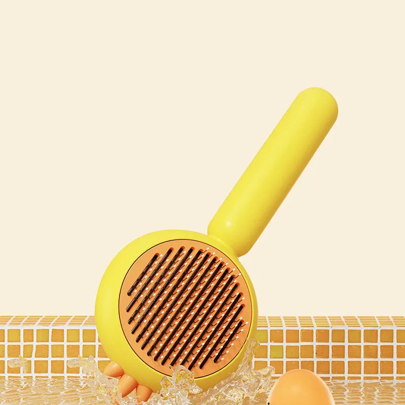 Purple pet grooming brush with self-cleaning button and bent stainless steel bristles