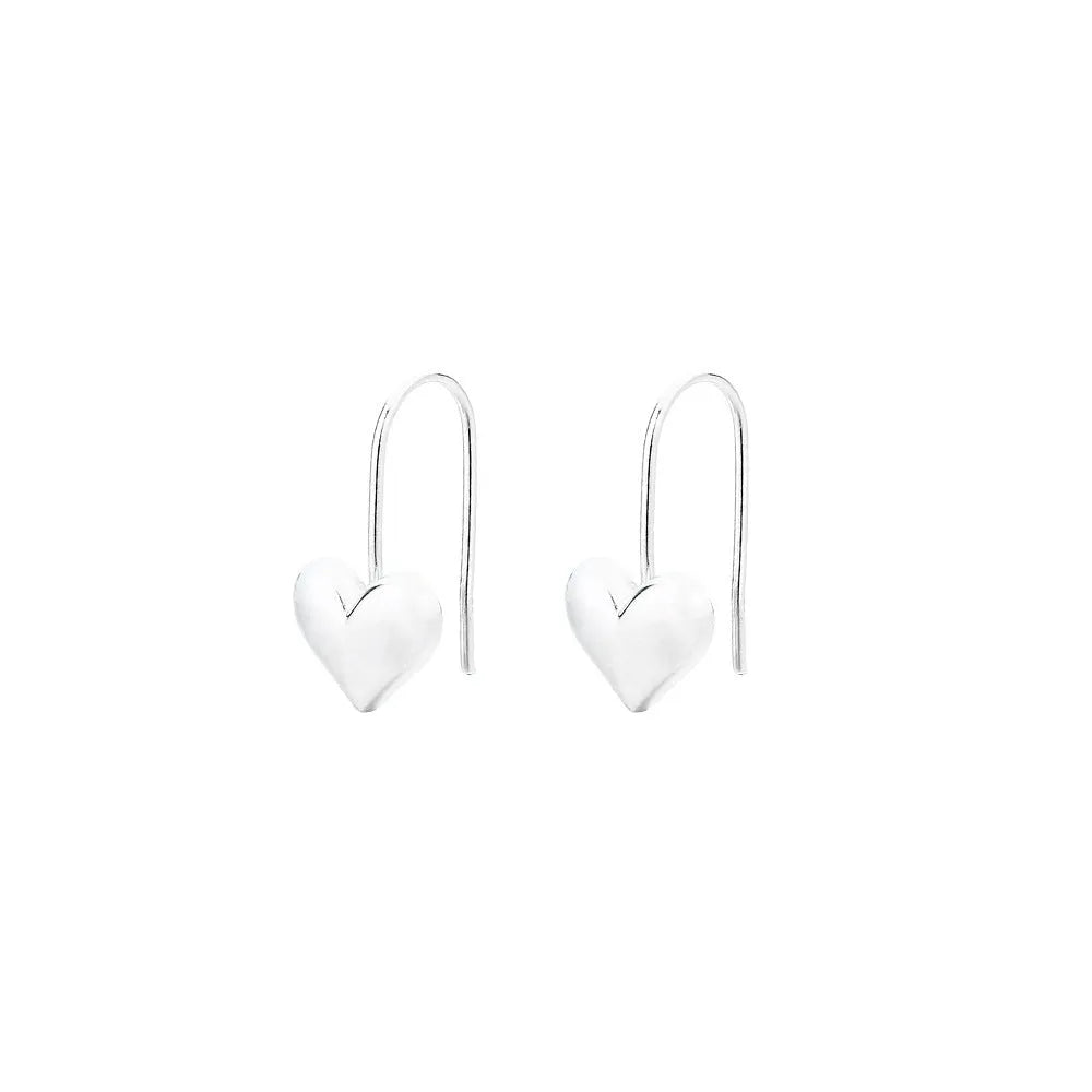 Silver-coloured three-dimensional heart-shaped earrings with glossy finish on copper