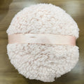 Large rectangular plush powder puff for makeup in pink, white, and skin colour options.