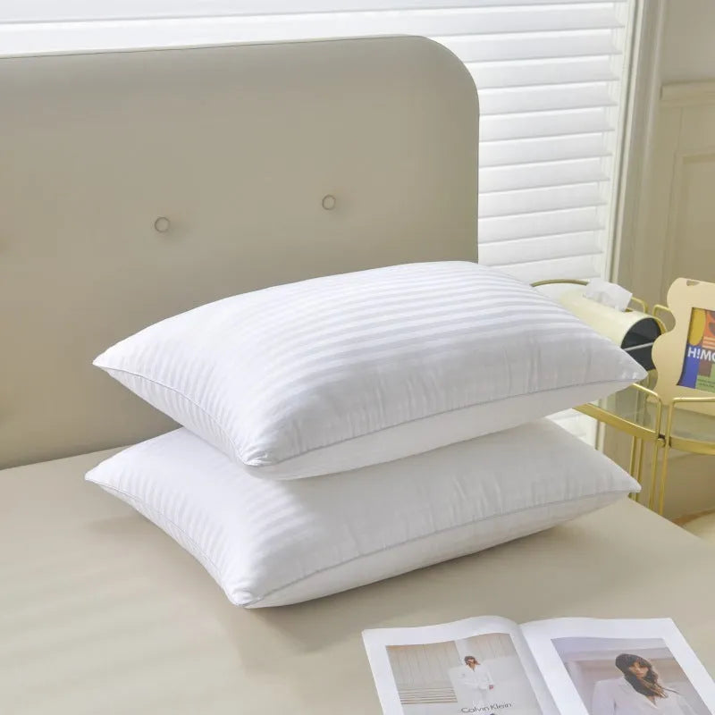 White cotton satin stripe pillow with feather and cotton fill, shown in three different size options.