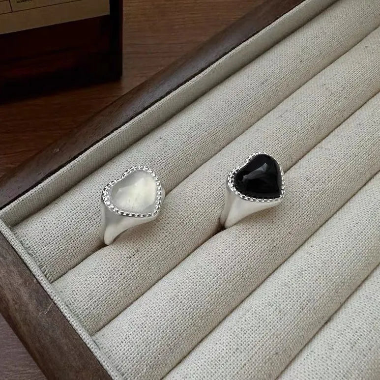 S925 sterling silver adjustable ring with black agate heart design in niche setting