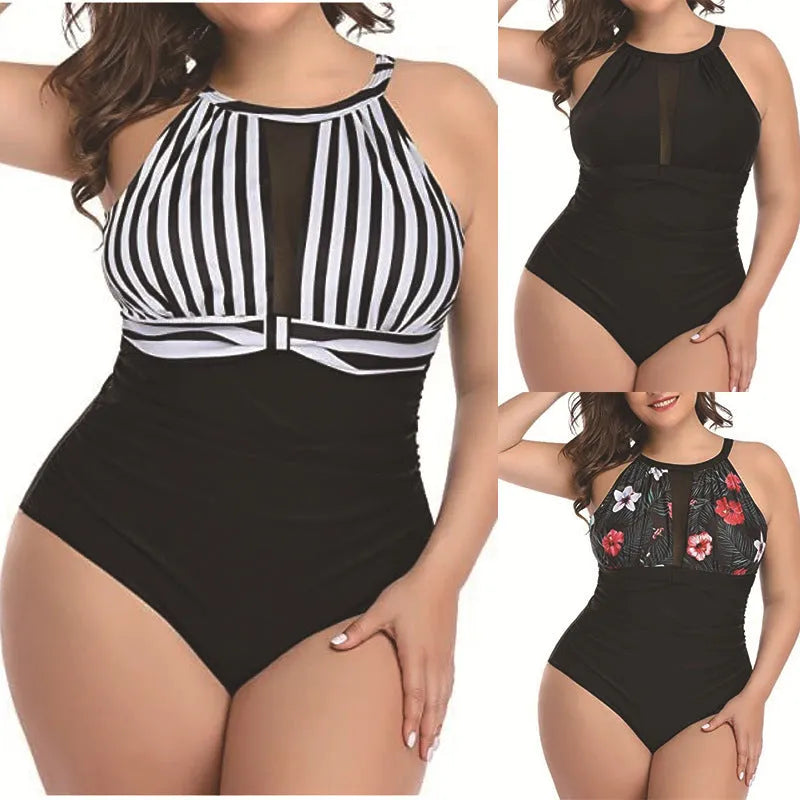 Women's black lace one-piece swimsuit on a hanger, showing front design.