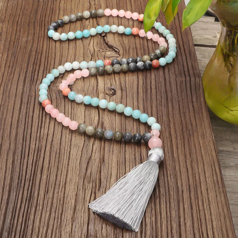 Stone necklace and bracelet set with colourful drop-shaped pendant and tassel decoration