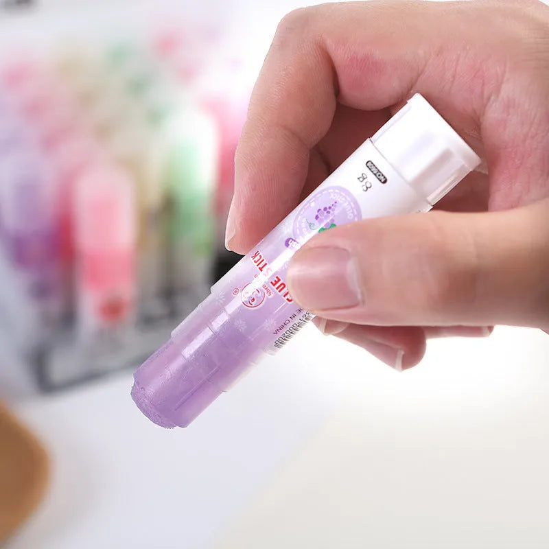 Two jelly solid glue sticks in bright colours for student crafts and handmade projects
