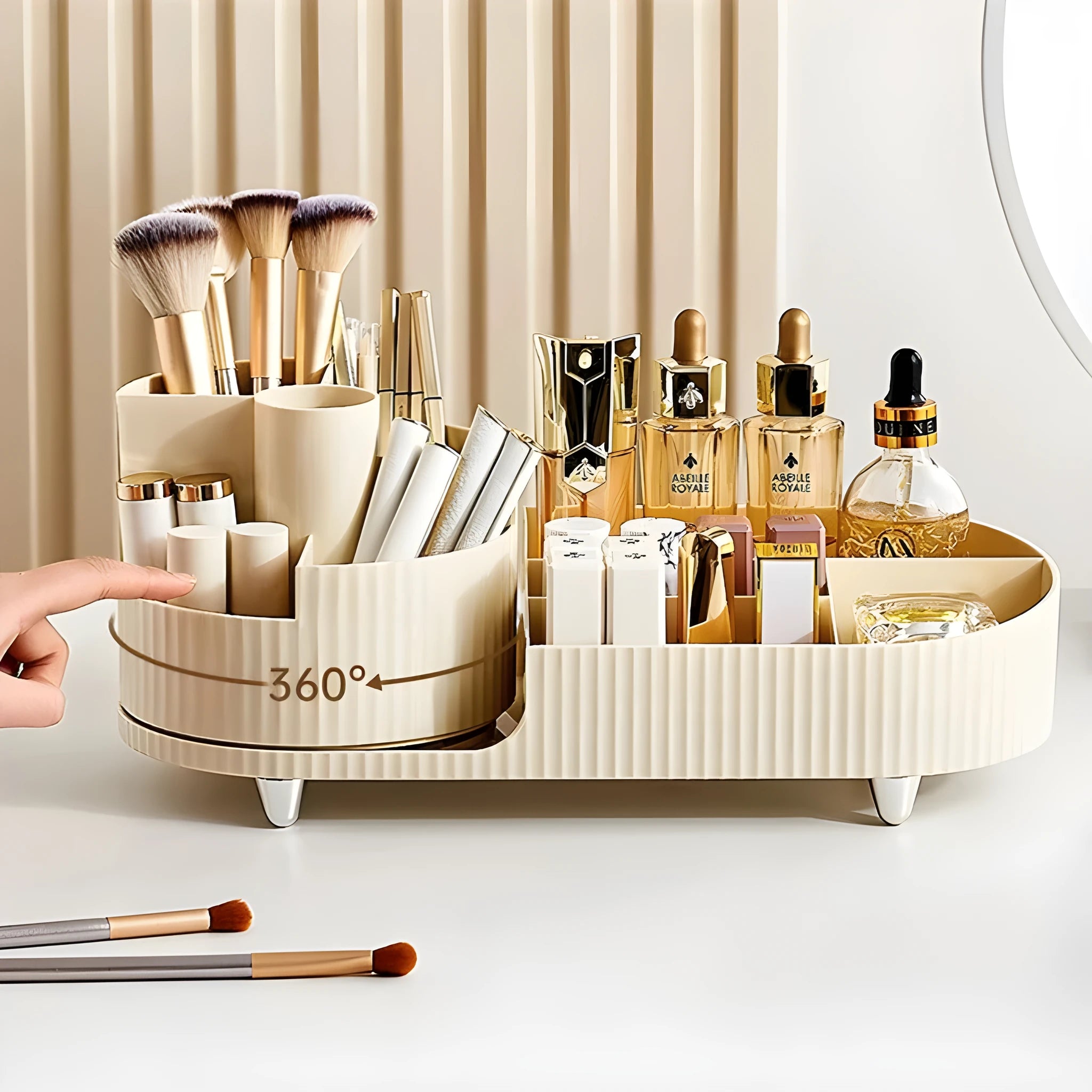 Rotating cosmetics storage box with two shelves holding makeup brushes and beauty products