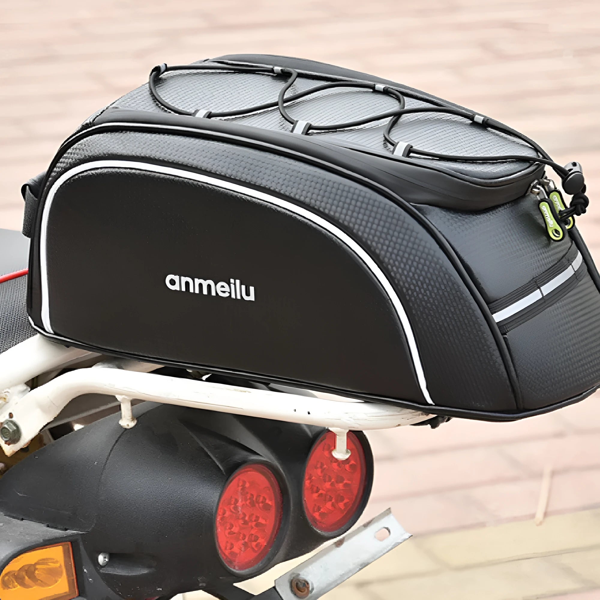 Waterproof black bicycle rack bag with 8L capacity mounted on bicycle rear rack