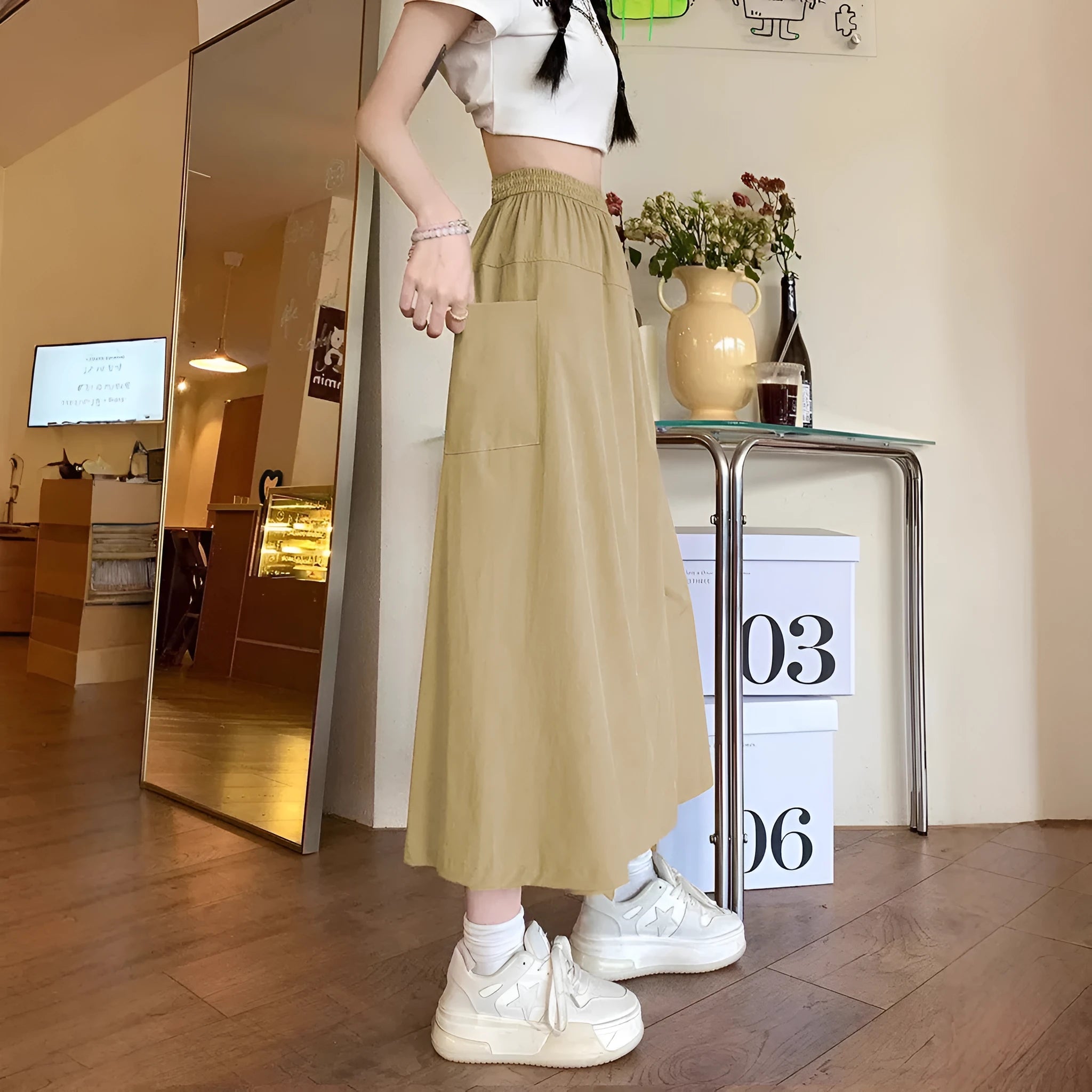 Camel-colour women's wide-leg cropped skirt with elastic waist and quilting details