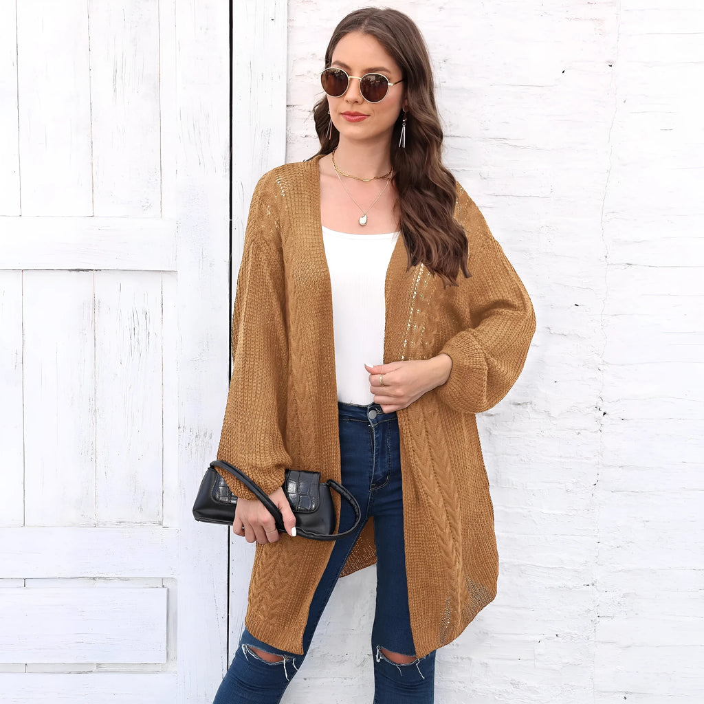 Women's loose acrylic sweater coat cardigan in army green colour, shown on a hanger.