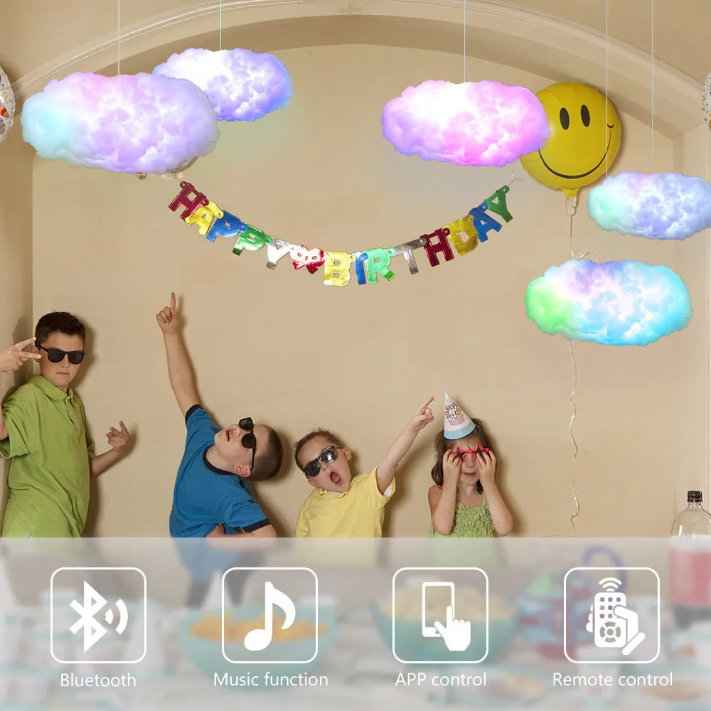 Large white fabric cloud shaped USB light hanging from ceiling with multi-colour RGBIC glow.