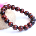 Red tigereye lightning cat's eye wood alexandrite bracelet with geometric ethnic styling