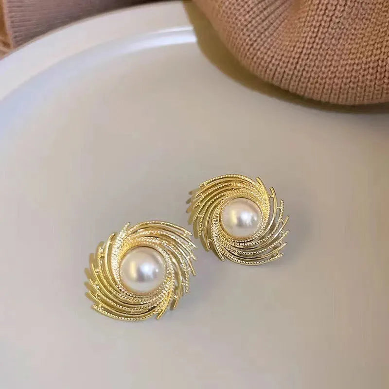 Women's vintage floral earrings with pearl accents and electroplated alloy construction