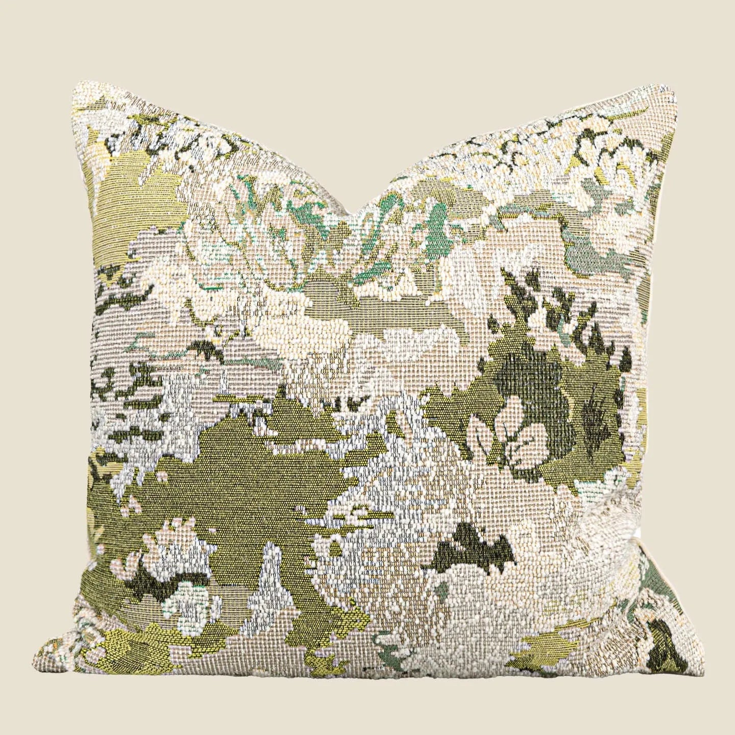Green wool blend cushion cover with a spring flowers botanical pattern, shown in square and lumbar sizes.